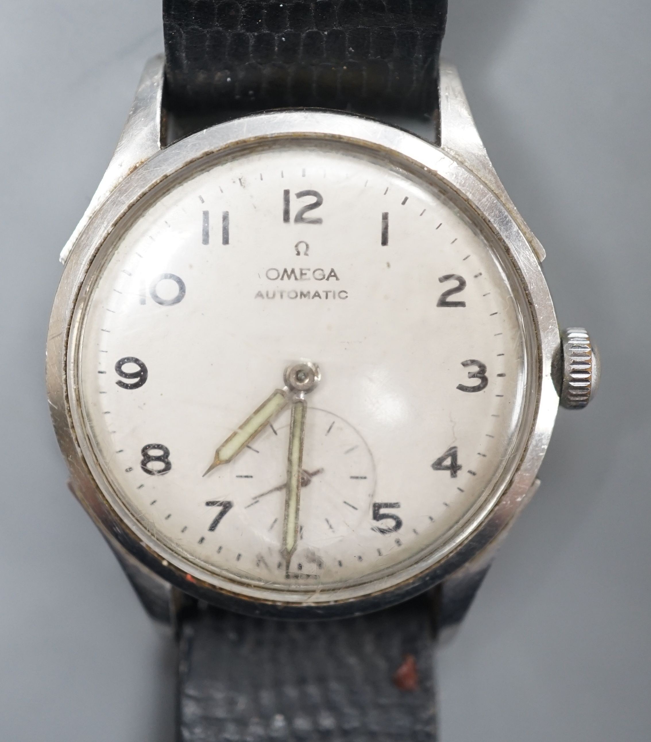A gentleman's 1940's? stainless steel Omega Automatic wrist watch, with Arabic dial and subsidiary seconds, on associated leather strap.